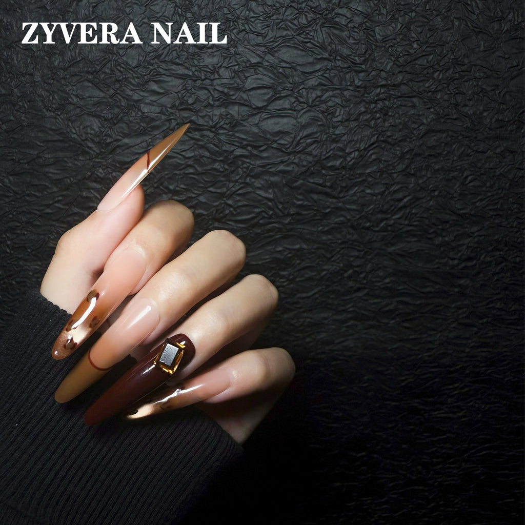 amber brown tortoiseshell long coffin press-on nails worn on hand