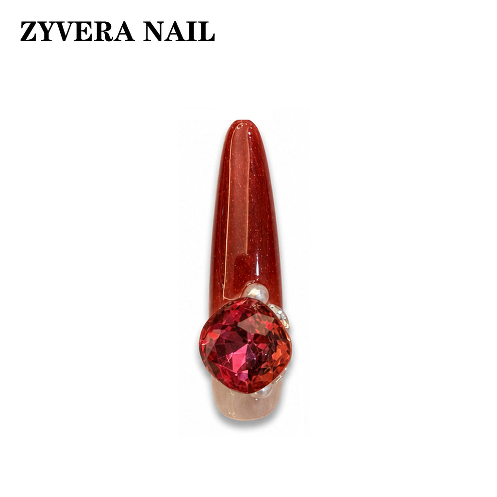 ruby red ombre crystal almond press-on nails single nail macro detail