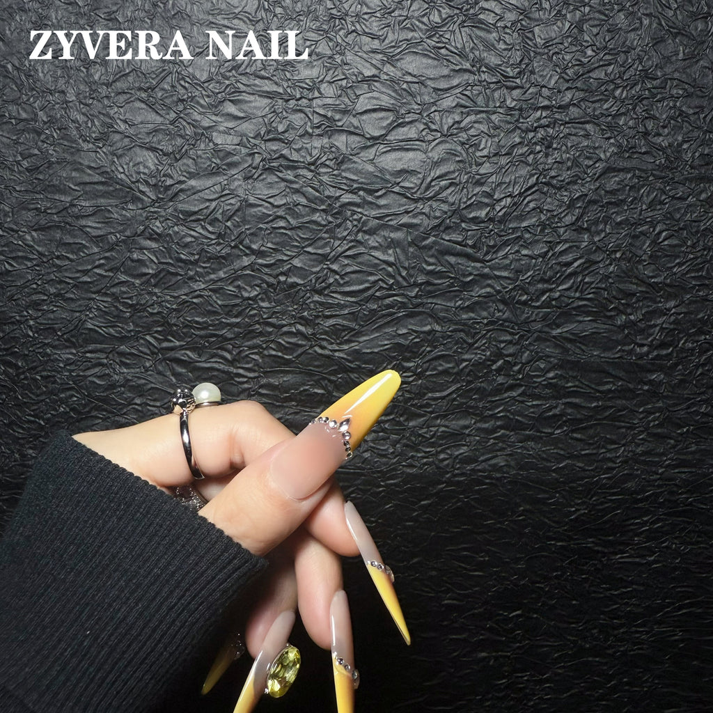 yellow nude ombre citrine crystal almond press-on nails worn on hand